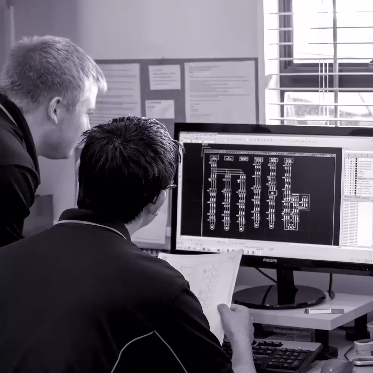 team looking at the screen